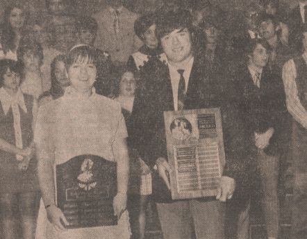 Dixie Lemmon (left) and John Crabb (right) presented awards for musical accomplishments in high school, June 1971