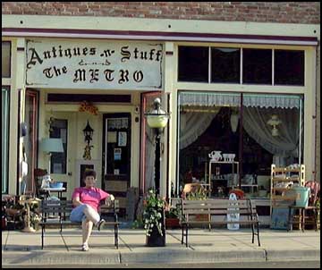 Alverna Godinez in front of her Metro Antiques