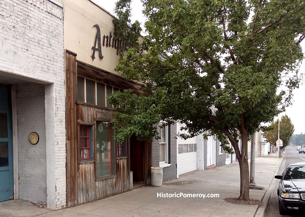 The sign on the former antiques store