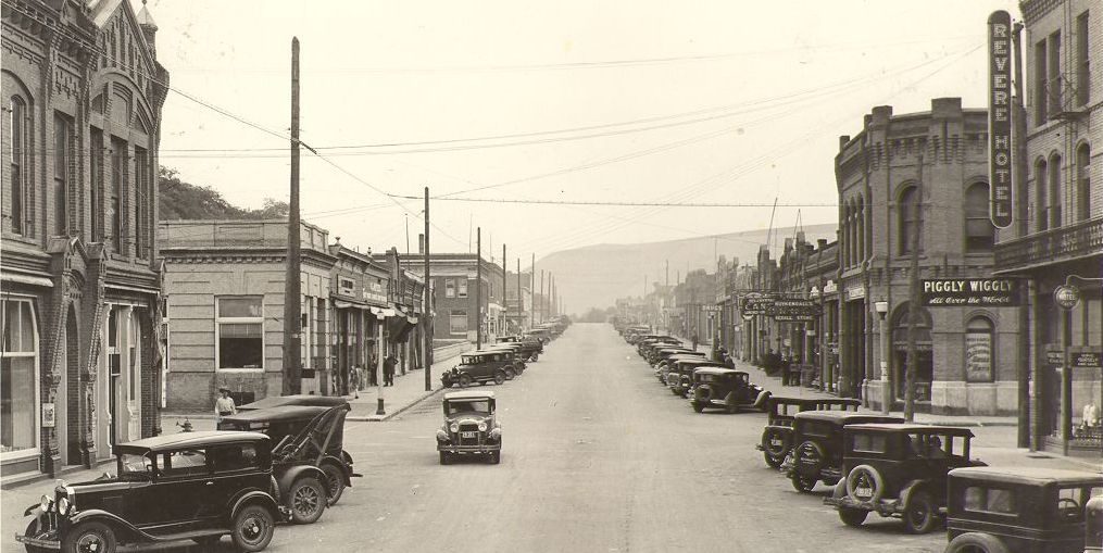 From the mid-late 1920s is this picture of Main Street, Pomeroy, with the Piggly Wiggly sign hanging on the corner of the Hotel Revere